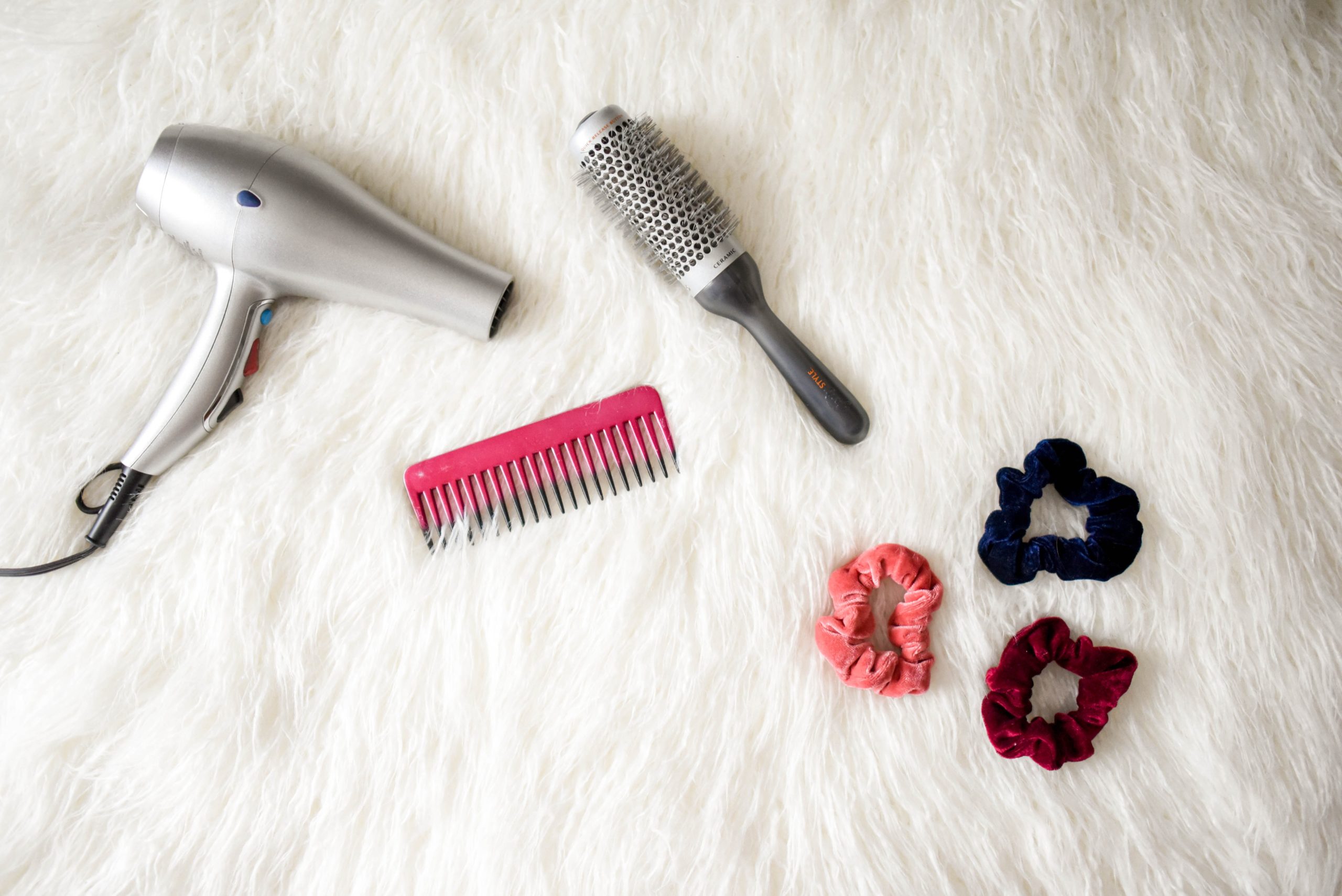 grey-hair-blower-near-pink-hair-combs-and-scrunchies-973402-scaled.jpg